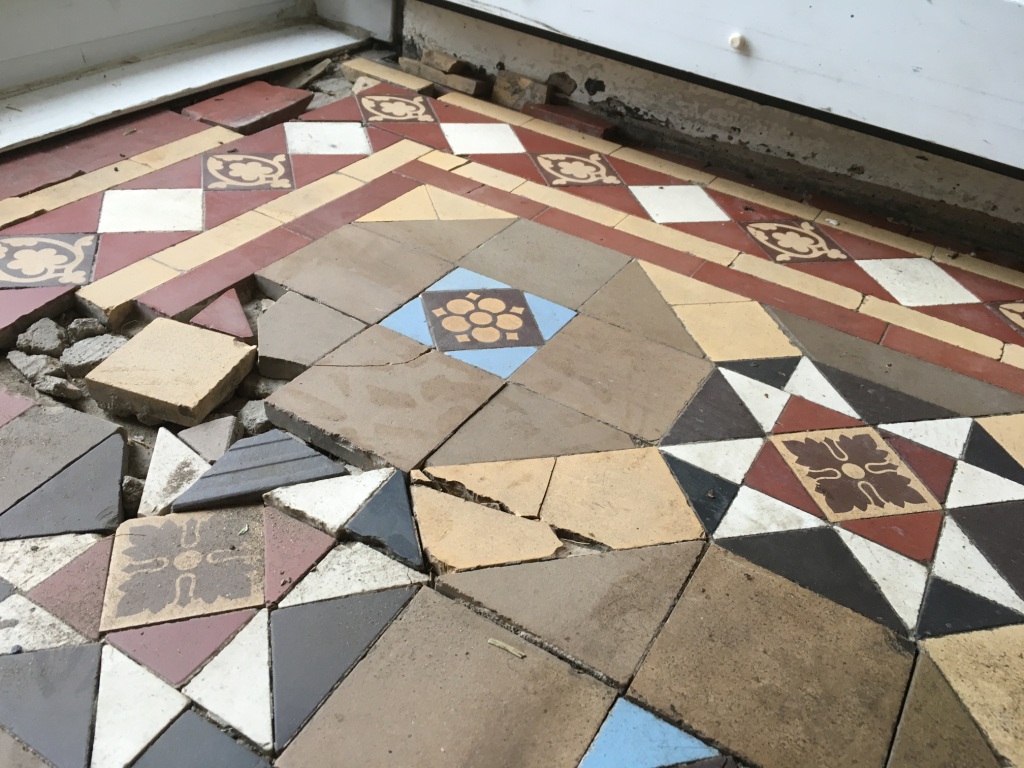 Victorian Tiled Hallway Floor Before Rebuild in Epsom