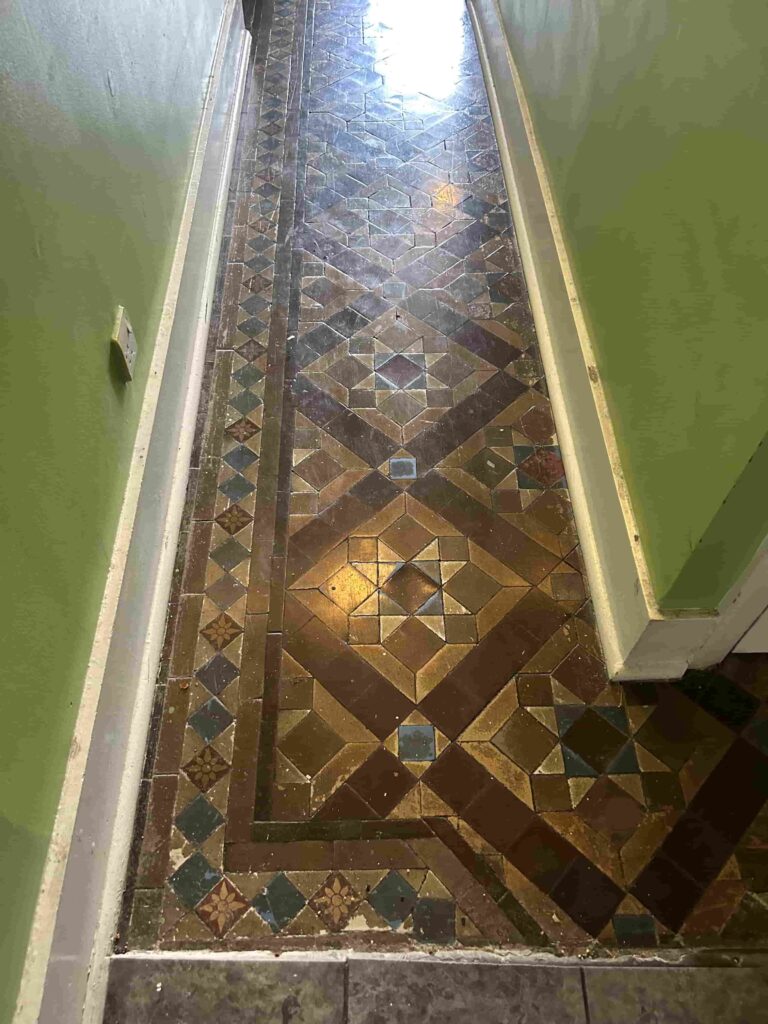 Wax Covered Victorian Tiled Hallway Floor Before Cleaning Addlestone